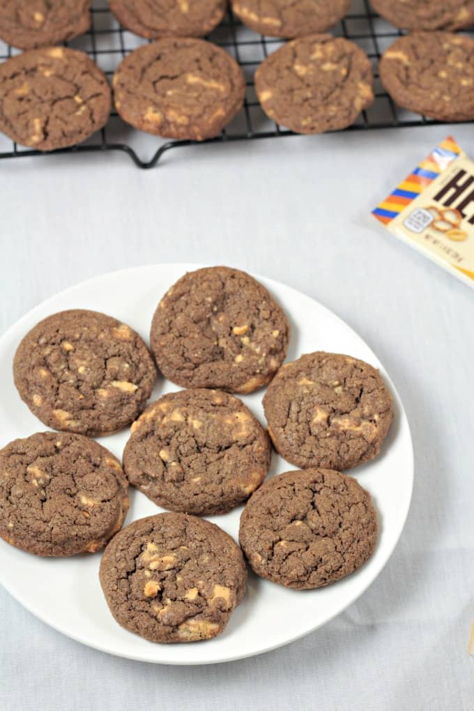 Chocolate Hershey's Gold Cookies - A classic thin and chewy chocolate cookie with chunks of new Hershey's Gold candy bar (caramelzed creme, pretzels and peanuts). Made with flour, granulated and light brown sugar, eggs, cocoa, vanilla, baking soda and salt. Makes nearly 5 dozen cookies!