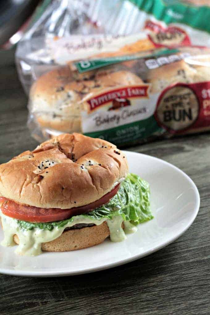 Avocado Ranch Grilled Burger features a third pound beef patty and an easy and flavorful avocado ranch dressing made with packaged ranch seasoning, mayonnaise, sour cream and a splash of milk. Served on a Pepperidge Farm Bakery Classic Onion Bun.