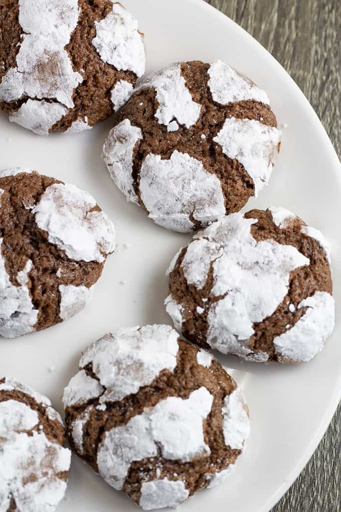 Chocolate Crinkle Cookies have a brownie like texture, are made with cocoa powder and powdered sugar. They look very impressive and are so easy to make!