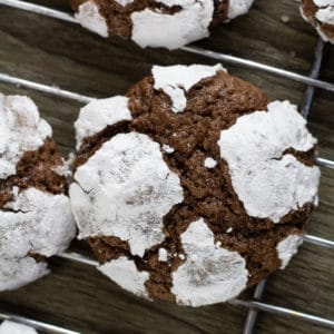 Chocolate Crinkle Cookies have a brownie like texture, are made with cocoa powder and powdered sugar. They look very impressive and are so easy to make!