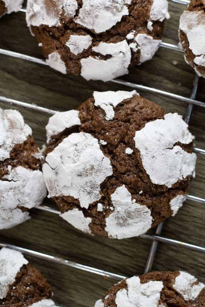 Chocolate Crinkle Cookies have a brownie like texture, are made with cocoa powder and powdered sugar. They look very impressive and are so easy to make!