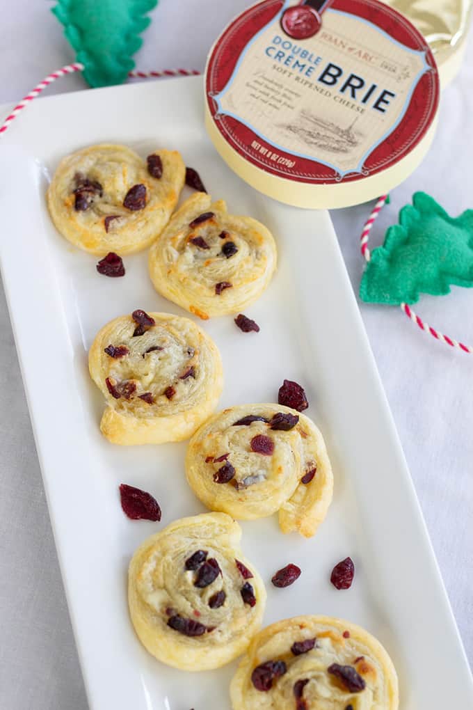 Dried Cranberry Brie Pinwheels: combine puff pastry, craisins and cheese for an easy and impressive appetizer or party food perfect for entertaining. 