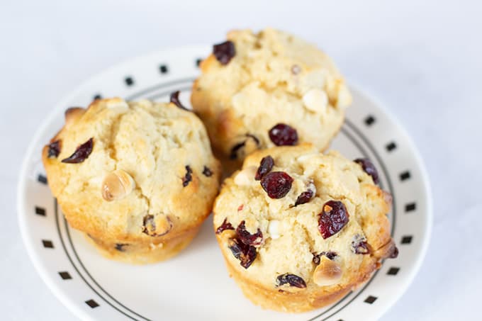 White Chocolate Chip Craisin Muffins are a traditional vanilla muffin with the grown up taste of sweet craisins and white chocolate chips. 