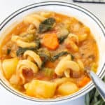 Potato Pasta Kale Soup is a hearty Italian soup that features tomatoes, paprika, fresh thyme and rosemary. Vegan/vegetarian option available.