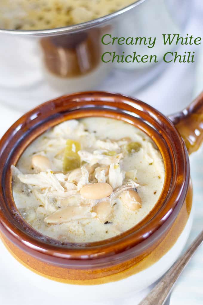 Creamy White Chicken Chili combines chicken, white beans, green chiles, broth, sour cream and spices to make a quick and comforting dish. 