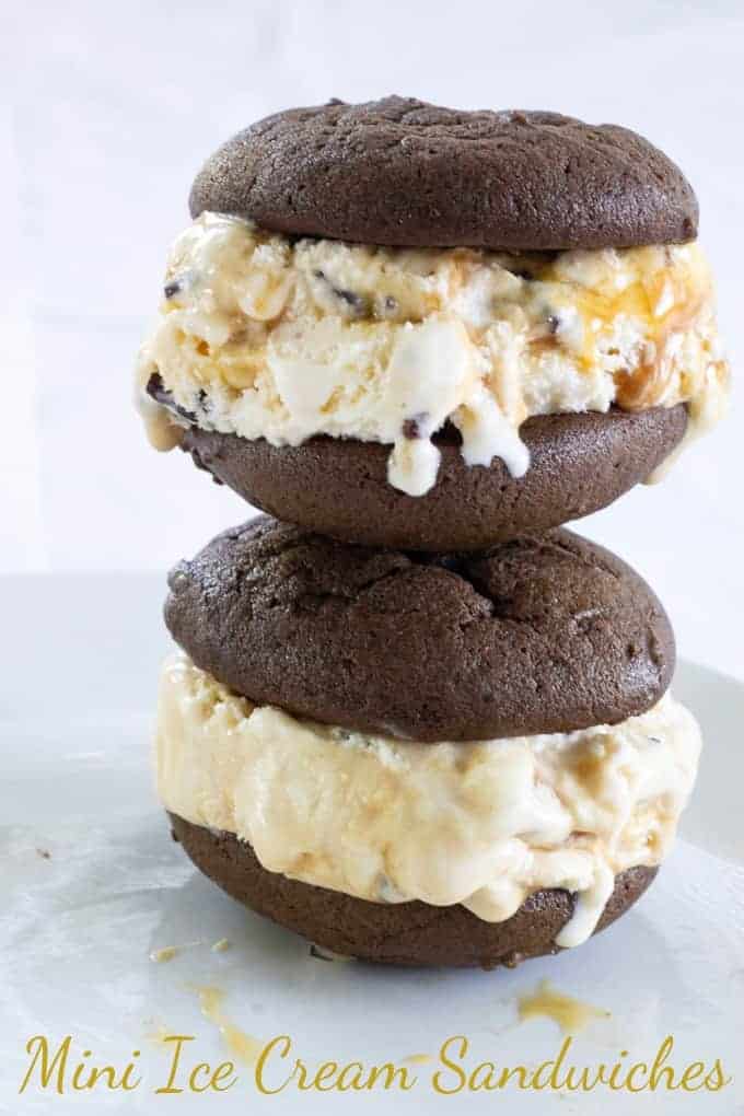 Mini Ice Cream Sandwiches are soft chocolate cookies filled with ice cream that has chocolate chunks and swirls of sea salt caramel to make a yummy dessert!