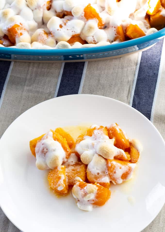 Sweet Potatoes with Marshmallows feature canned sweet potatoes, butter, brown sugar, and mini marshmallows. A traditional Thanksgiving side dish.