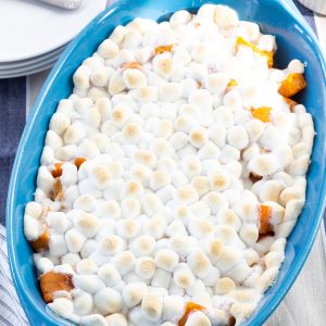 Sweet Potatoes with Marshmallows feature canned sweet potatoes, butter, brown sugar, and mini marshmallows. A traditional Thanksgiving side dish.