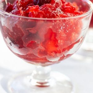 Cranberry Pineapple Jello Salad features whole berry cranberry sauce, crushed pineapple, and raspberry jello. A tasty way to perk up canned cranberry sauce.