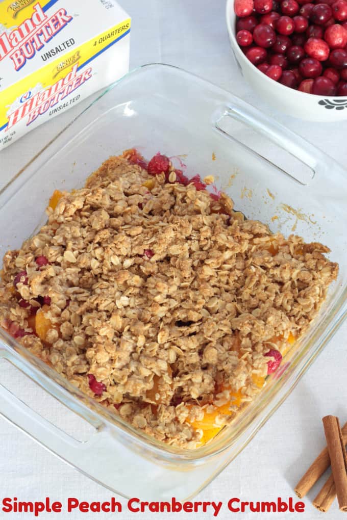 Simple Peach Cranberry Crumble features canned peaches and fresh cranberries, topped with a wholesome spiced cinnamon oat crumble and baked to perfection!