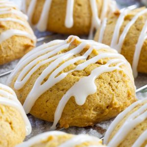Pumpkin Cookies with Marshmallow Glaze are made with canned pumpkin and cinnamon then topped with an easy 4 ingredient marshmallow glaze.