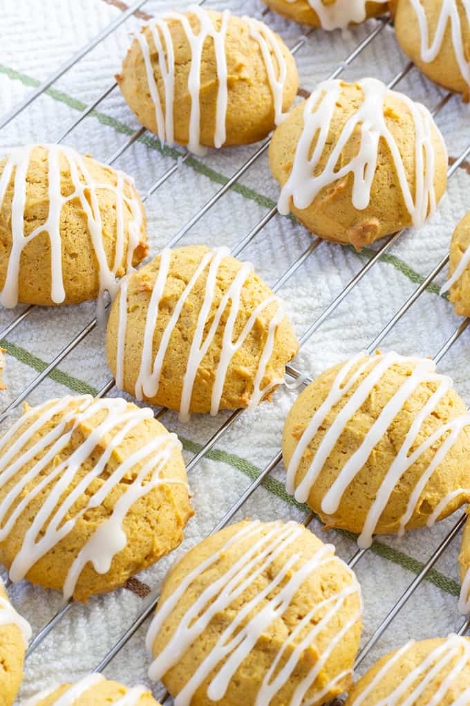 Pumpkin Cookies with Marshmallow Glaze are made with canned pumpkin and cinnamon then topped with an easy 4 ingredient marshmallow glaze.