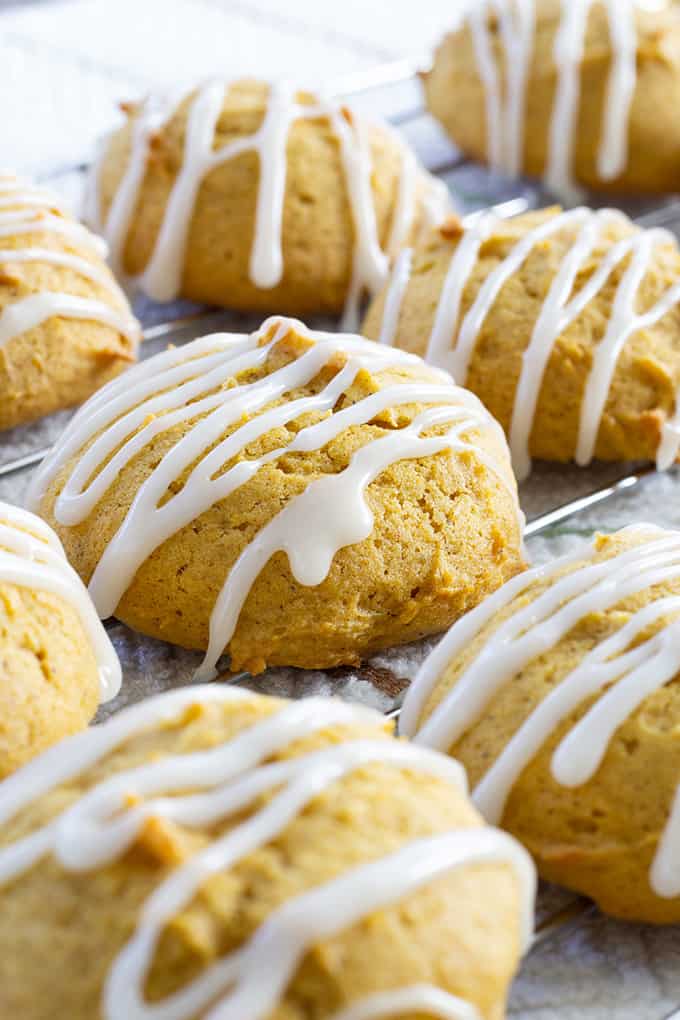 Pumpkin Cookies with Marshmallow Glaze are made with canned pumpkin and cinnamon then topped with an easy 4 ingredient marshmallow glaze.