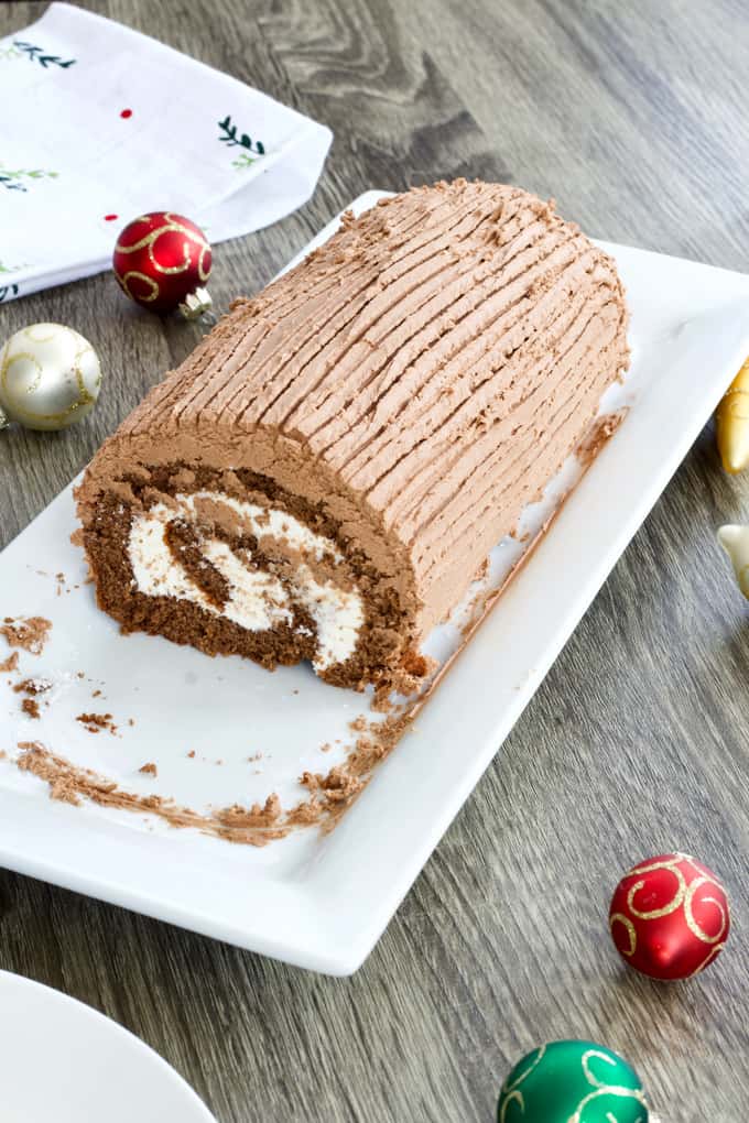 Chocolate Yule Log features chocolate sponge cake filled with cream cheese frosting adn topped with a chocolate frosting. Lightened up with Sweet'N Low. 