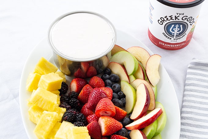 Heavenly Party Fruit Dip combines just 3 ingredients, Greek yogurt, cream cheese, and marshmallow cream to make this tasty dip that is perfect for fruit. 