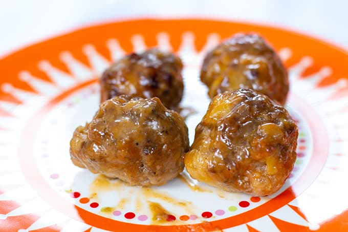 Made with sausage and beef, Sausage Pineapple Mini Meatballs are an easy to make show-stopping tangy and zesty appetizer perfect for a party or game day.