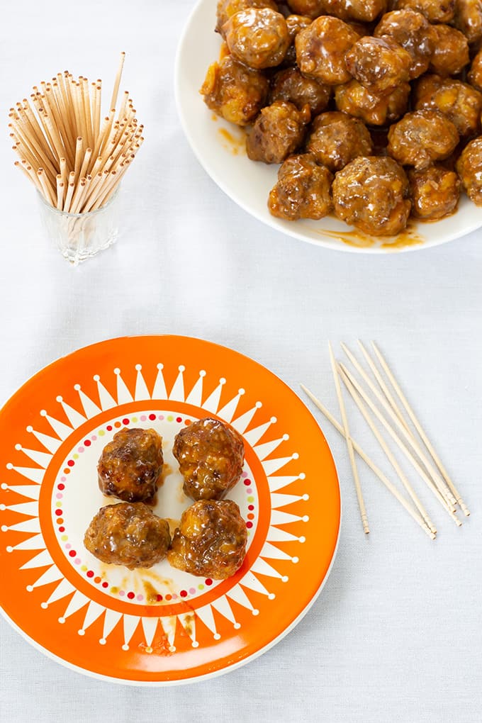 Made with sausage and beef, Sausage Pineapple Mini Meatballs are an easy to make show-stopping tangy and zesty appetizer perfect for a party or game day. 