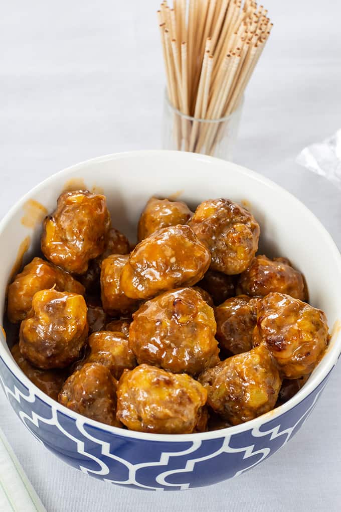Made with sausage and beef, Sausage Pineapple Mini Meatballs are an easy to make show-stopping tangy and zesty appetizer perfect for a party or game day. 