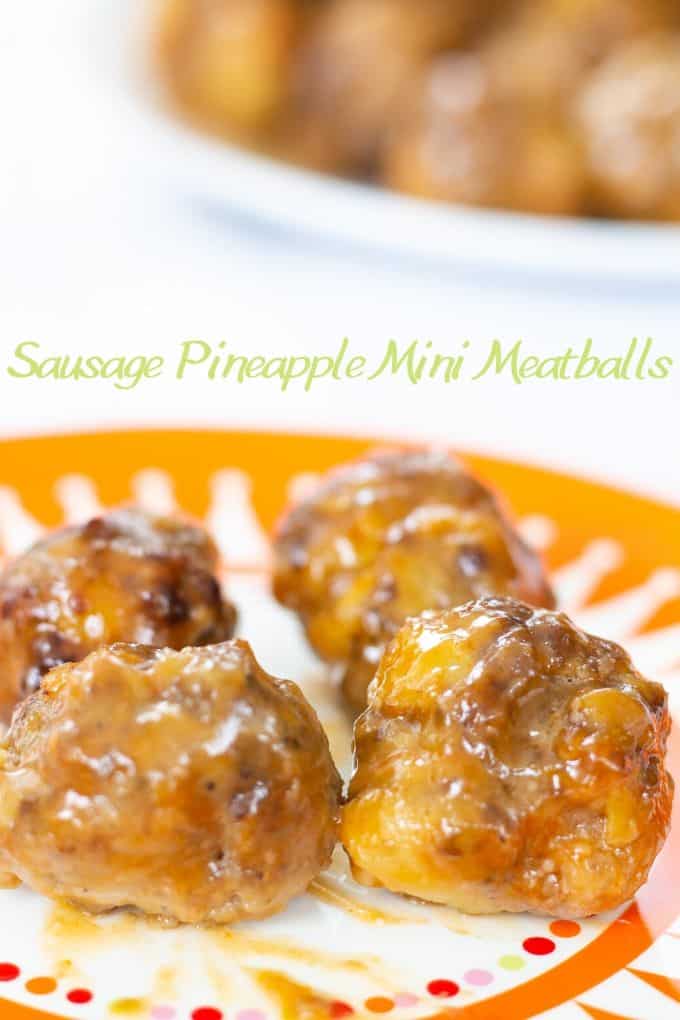 Made with sausage and beef, Sausage Pineapple Mini Meatballs are an easy to make show-stopping tangy and zesty appetizer perfect for a party or game day. 