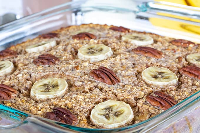 Chocolate Banana Nut Baked Oatmeal is a creamy version of the popular breakfast cereal featuring chocolate milk, bananas, nuts, and other pantry staples. 