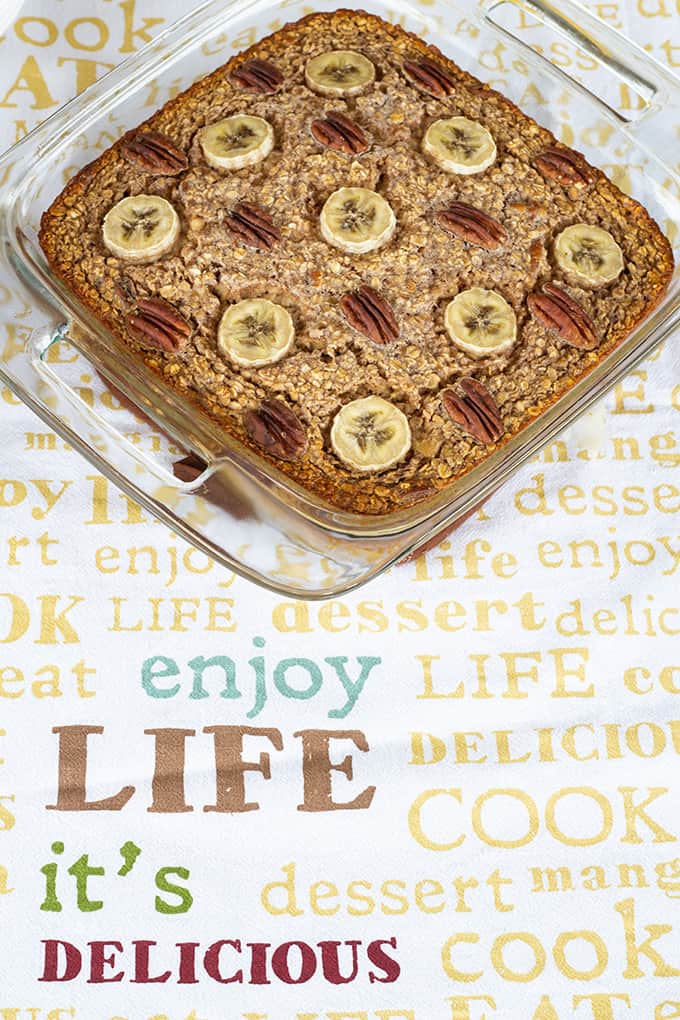 Chocolate Banana Nut Baked Oatmeal is a creamy version of the popular breakfast cereal featuring chocolate milk, bananas, nuts, and other pantry staples. 