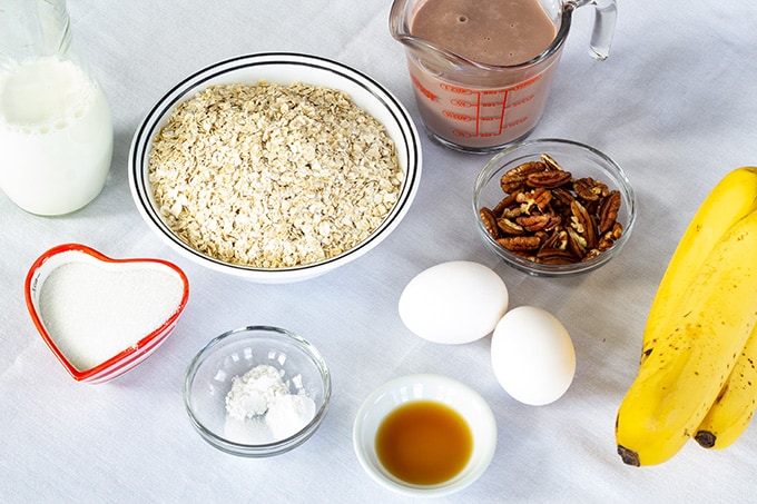 Chocolate Banana Nut Baked Oatmeal is a creamy version of the popular breakfast cereal featuring chocolate milk, bananas, nuts, and other pantry staples. 