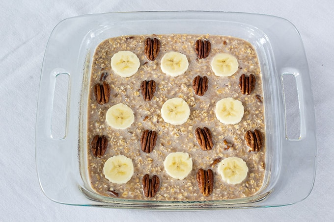 Chocolate Banana Nut Baked Oatmeal is a creamy version of the popular breakfast cereal featuring chocolate milk, bananas, nuts, and other pantry staples. 