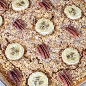 Chocolate Banana Nut Baked Oatmeal is a creamy version of the popular breakfast cereal featuring chocolate milk, bananas, nuts, and other pantry staples.