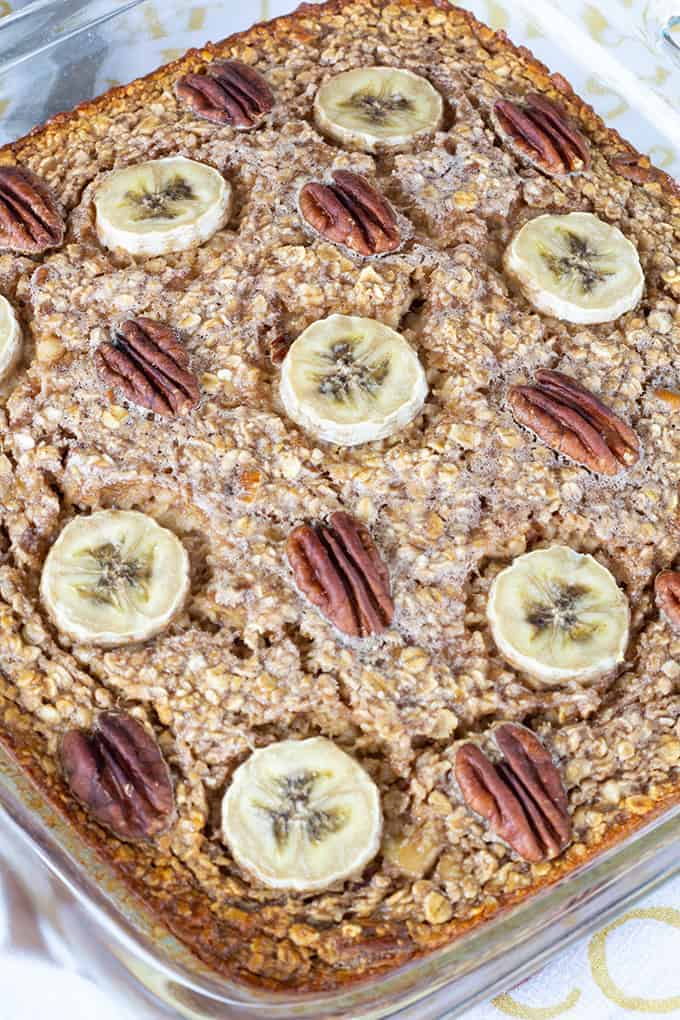 Chocolate Banana Nut Baked Oatmeal is a creamy version of the popular breakfast cereal featuring chocolate milk, bananas, nuts, and other pantry staples. 