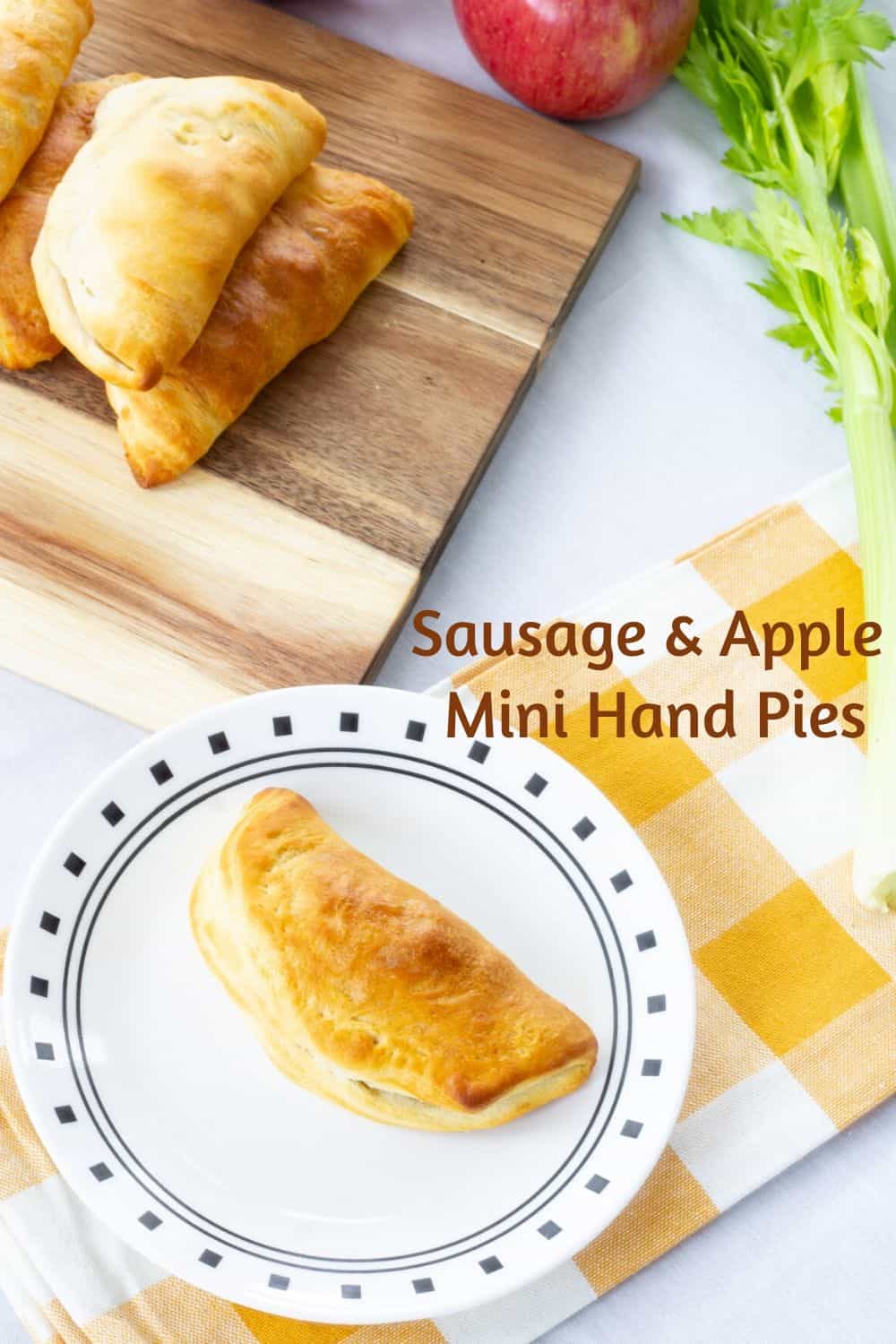 Sausage & Apple Hand Pies are made with ground sausage, apples, celery, and canned biscuits for a tasty mini hand held snack that is so easy to make!