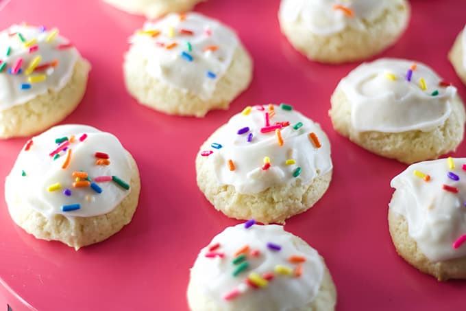 Glazed Sour Cream Cookies are soft and fluffy cake like cookies that are sure to become a favorite for holidays and parties all year around.