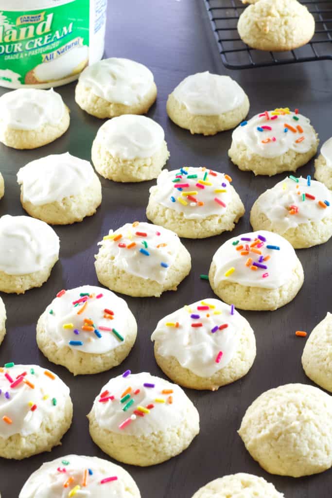 Glazed Sour Cream Cookies are soft and fluffy cake like cookies that are sure to become a favorite for holidays and parties all year around. 