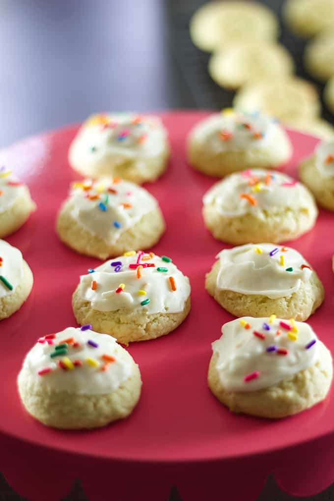 Glazed Sour Cream Cookies are soft and fluffy cake like cookies that are sure to become a favorite for holidays and parties all year around. 