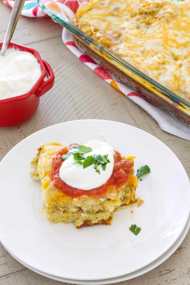 Tater Tot Breakfast Casserole - tater tots, eggs, milk and spices baked to perfection and topped with lots of cheese, sour cream and salsa.