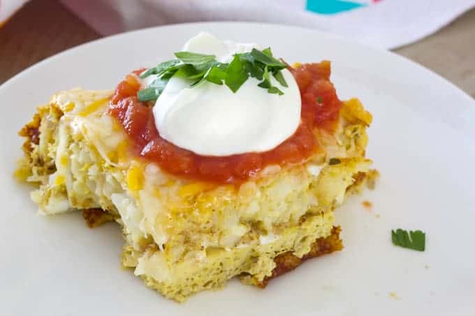 Tater Tot Breakfast Casserole - tater tots, eggs, milk and spices baked to perfection and topped with lots of cheese, sour cream and salsa.