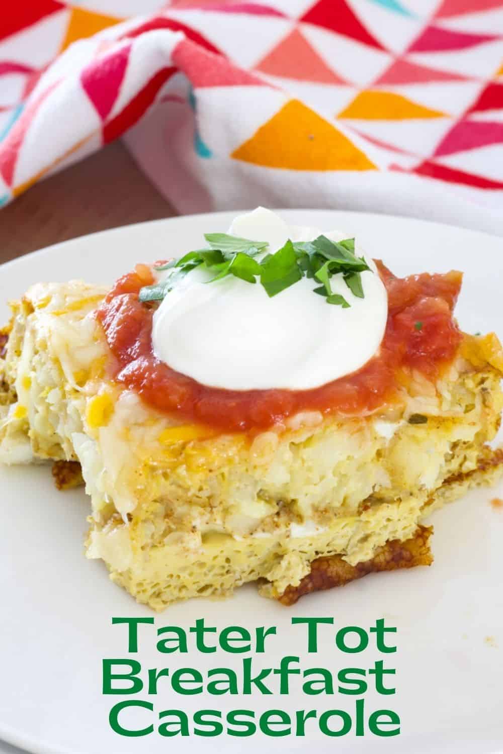 Tater Tot Breakfast Casserole - tater tots, eggs, milk and spices baked to perfection and topped with lots of cheese, sour cream and salsa. via @mindyscookingobsession