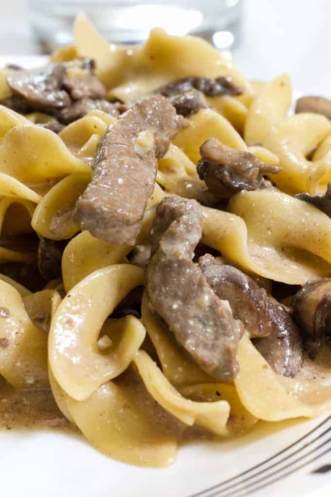 One Pan Beef Stroganoff features sirloin steak, egg noodles, beef broth and fresh mushrooms made in one skillet for quick and easy cleanup.