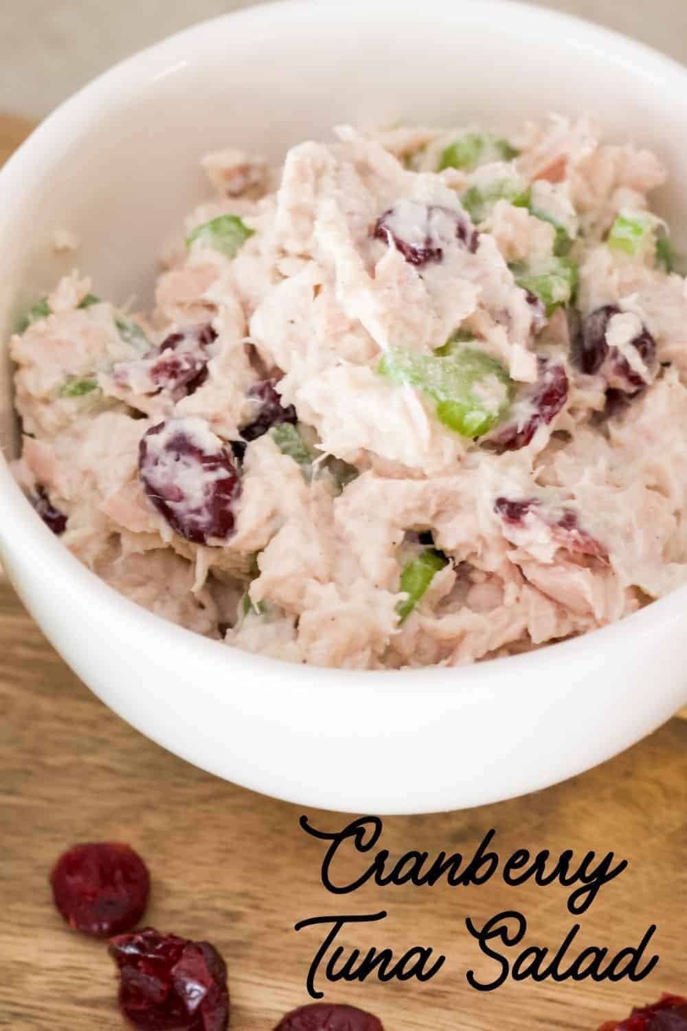 Healthy Cranberry Tuna Salad features canned tuna, mayo, Greek yogurt, celery, craisins, salt, pepper and a splash of lemon juice. So easy!