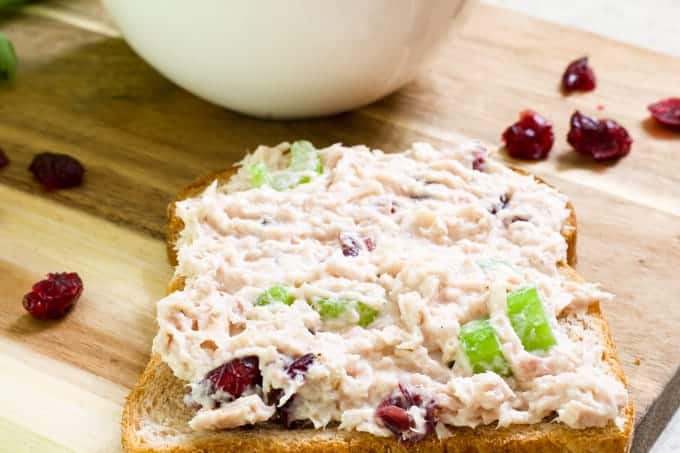 Healthy Cranberry Tuna Salad features canned tuna, mayo, Greek yogurt, celery, craisins, salt, pepper and a splash of lemon juice. So easy!