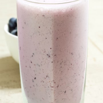 This five ingredient milk-based Healthy Blueberry Yogurt Smoothie features vanilla Greek yogurt and is as delicious as it is good for you!