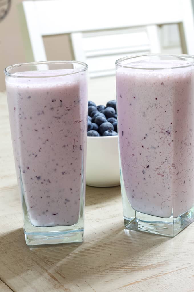 This five ingredient milk-based Healthy Blueberry Yogurt Smoothie features vanilla Greek yogurt and is as delicious as it is good for you!