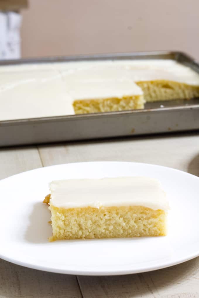 Old Fashioned Buttermilk Cake is very moist and is topped with a simple frosting that is poured over the warm cake. This recipe is so easy!