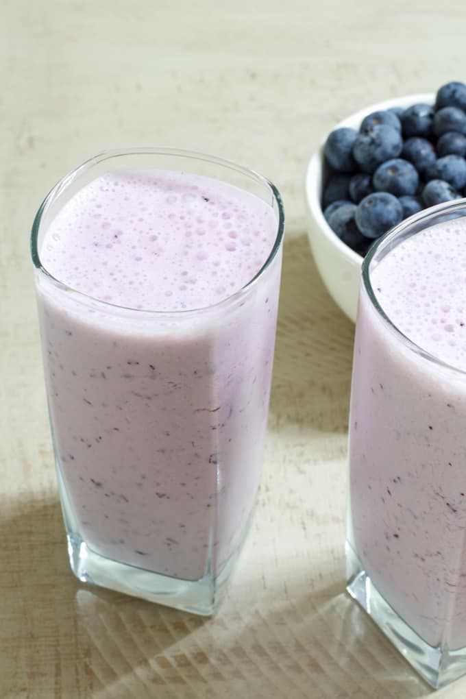 This five ingredient milk-based Healthy Blueberry Yogurt Smoothie features vanilla Greek yogurt and is as delicious as it is good for you!