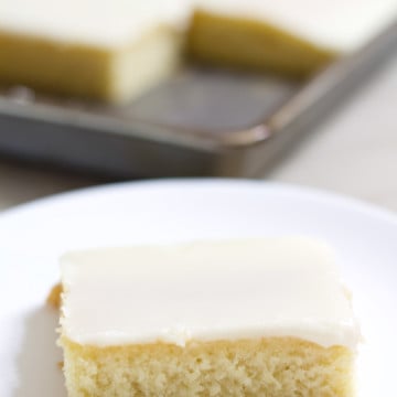 Old Fashioned Buttermilk Cake is very moist and is topped with a simple frosting that is poured over the warm cake. This recipe is so easy!