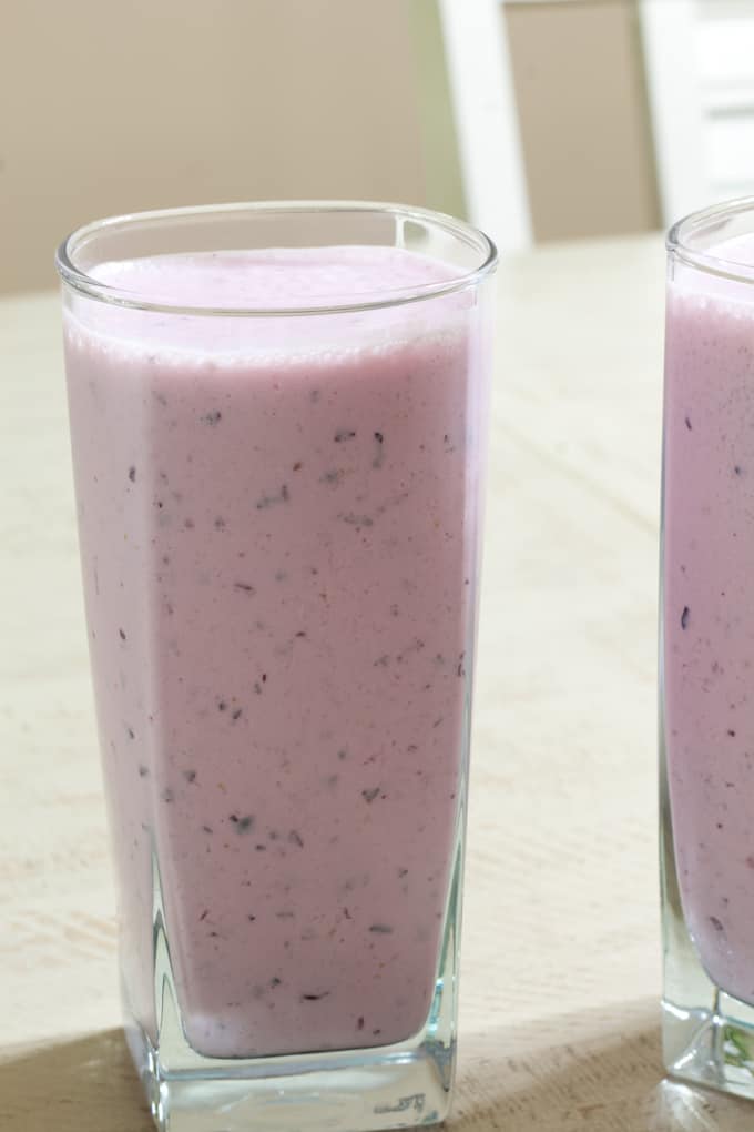 This five ingredient milk-based Healthy Blueberry Yogurt Smoothie features vanilla Greek yogurt and is as delicious as it is good for you!