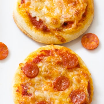 Mini Pepperoni Pizza Appetizers are super easy and require just 4 ingredients; store bought pizza crust, sauce, pepperoni and cheese.