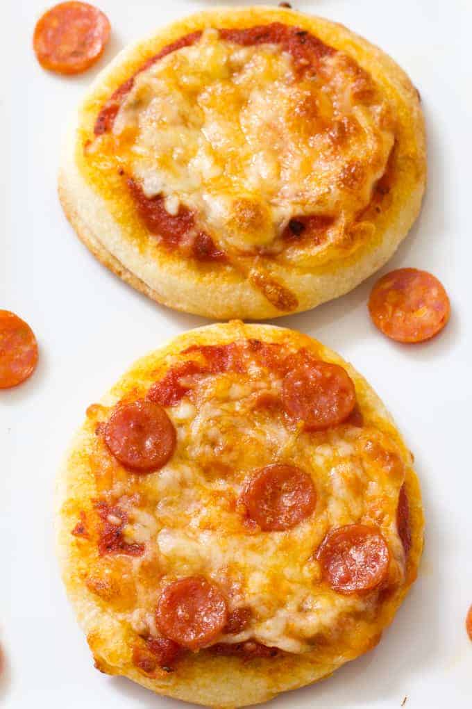 Mini Pepperoni Pizza Appetizers are super easy and require just 4 ingredients; store bought pizza crust, sauce, pepperoni and cheese.