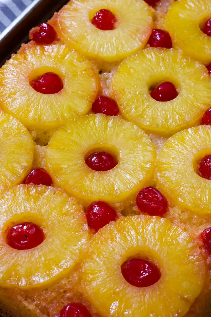 Pineapple Upside Down Cake recipe features pineapple and maraschino cherries and transforms boxed cake into an easy and special treat!