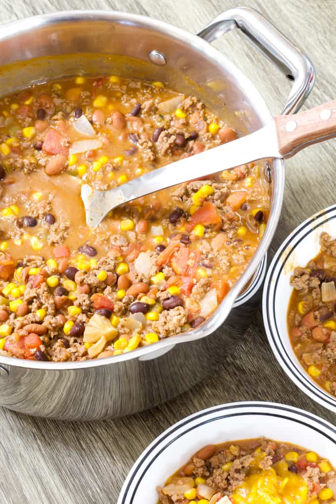 Mild Mexican Taco Chili features ground beef, tomatoes, two kinds of beans, corn, green chiles, taco seasoning and Ranch dressing. 