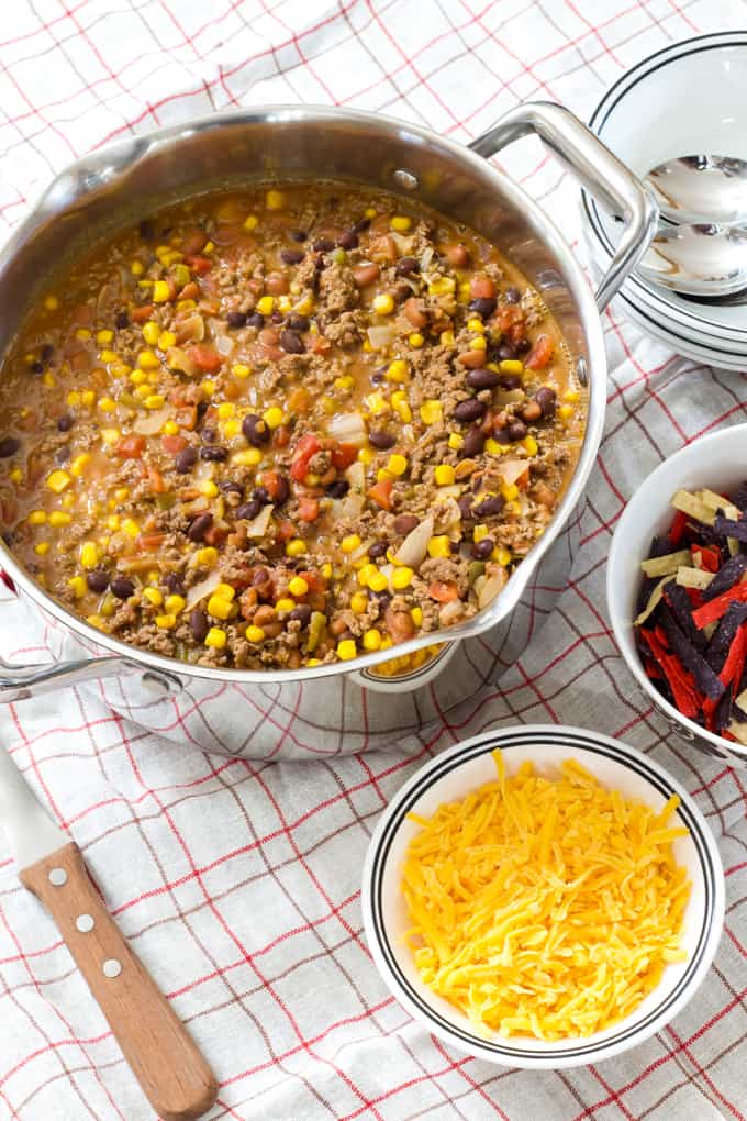 Mild Mexican Mexican Chili features ground beef, tomatoes, two kinds of beans, corn, green chiles, taco seasoning and Ranch dressing. 